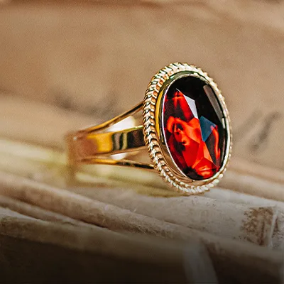 Bague grenat sertie et paillon garantie à vie